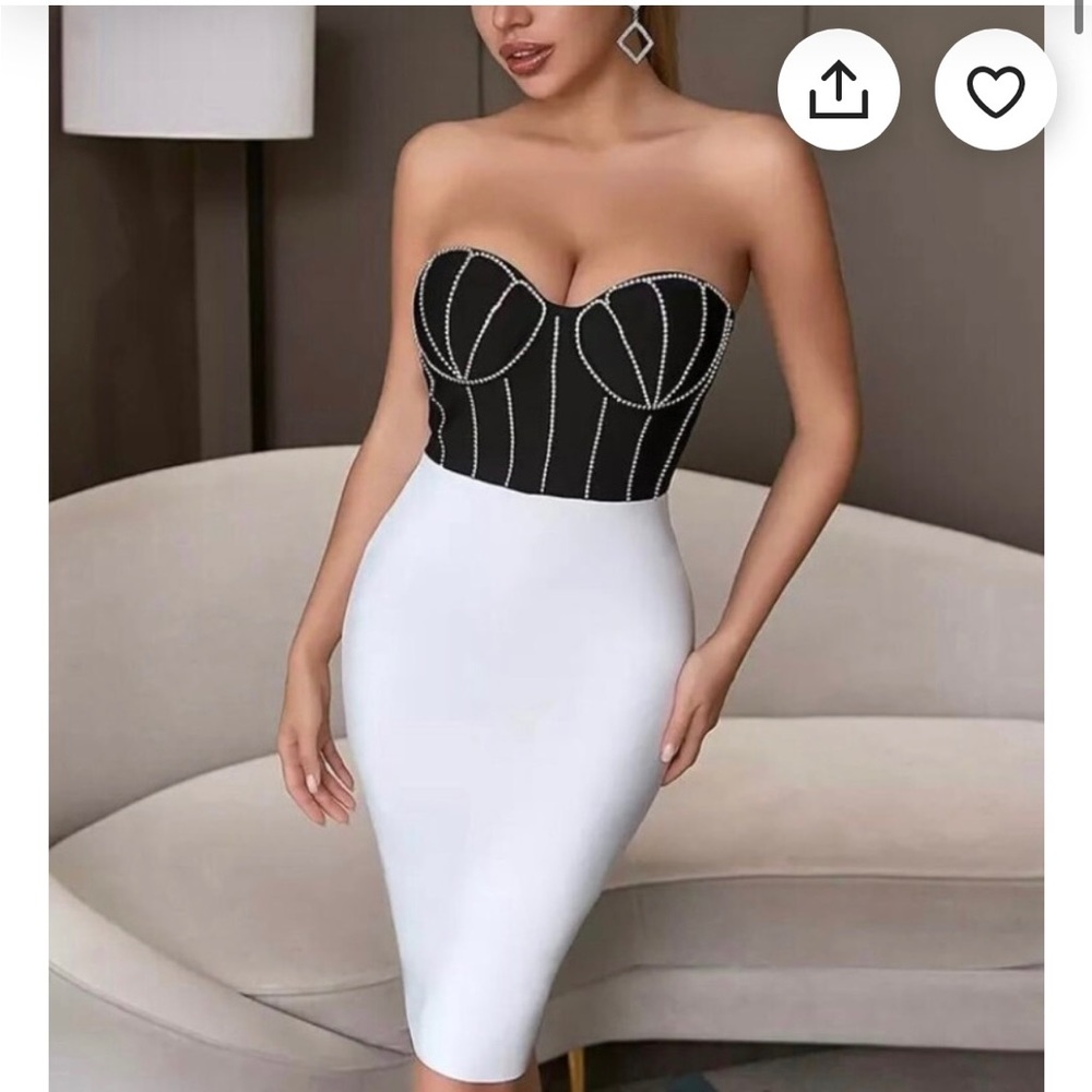 Black bandage with strapless rhinestones.